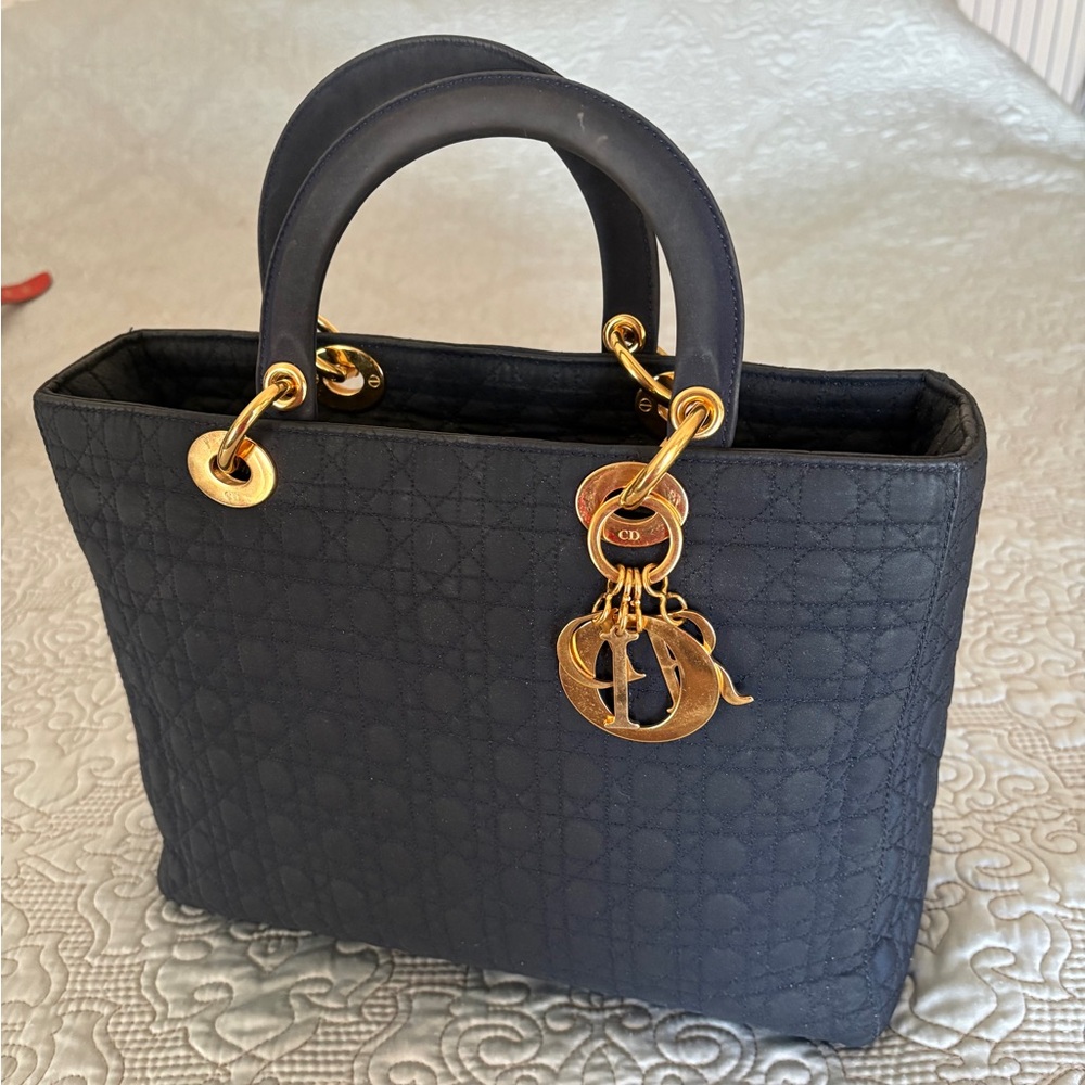 Vintage Black Lady Dior with 24-carat gold hardware.